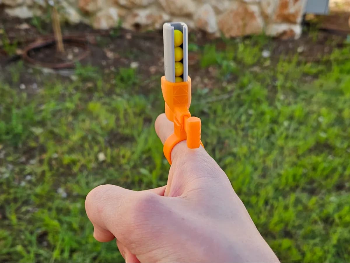 Mini Lançador de Dardos de Dedo